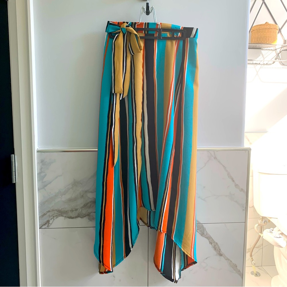San Souci Multi Colour Wrap Style Skirt.  Side Zip.  Side Slits.  Varied Hem.